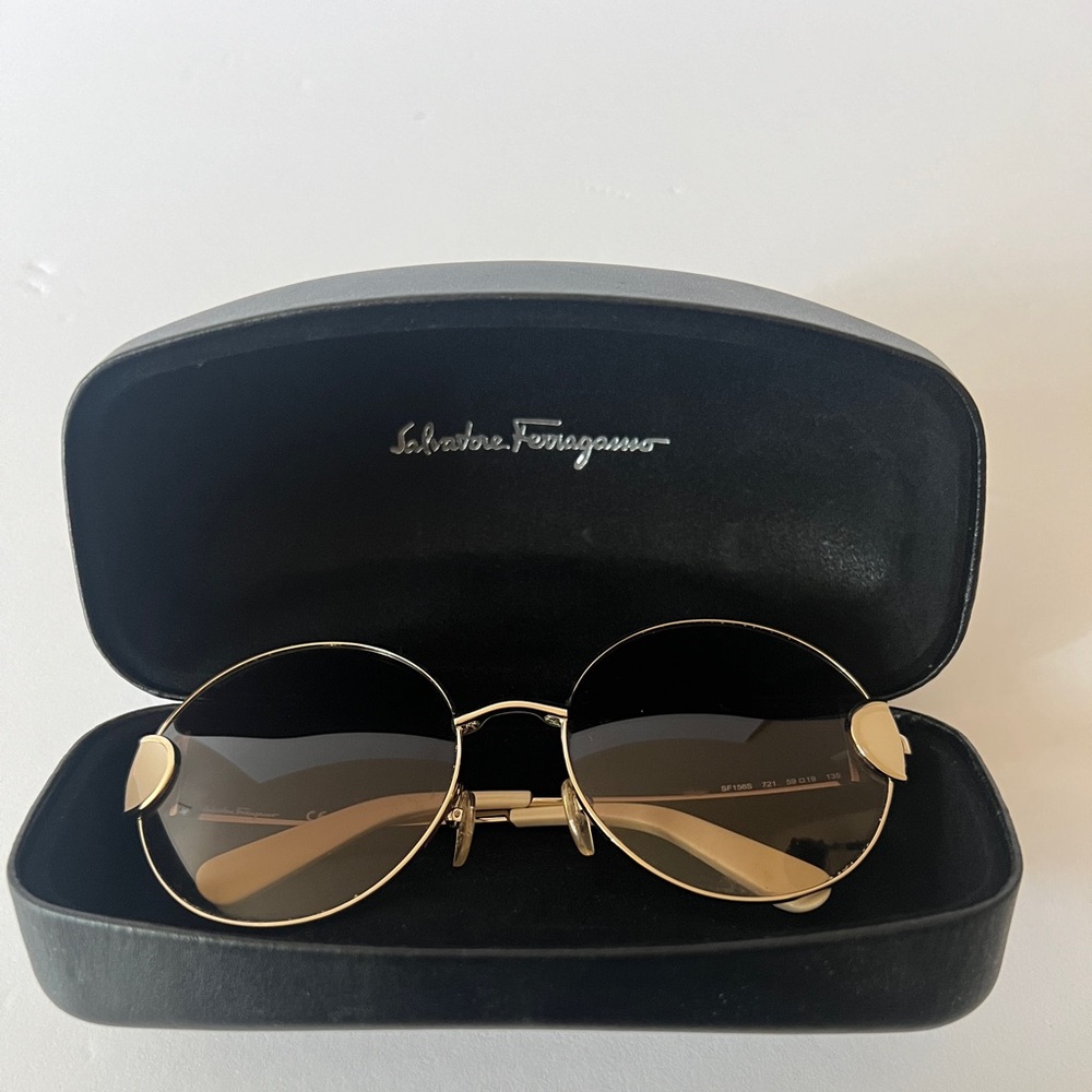 Salvatore Ferragamo sunglasses perfect condition. Cream & gold trim Round frames